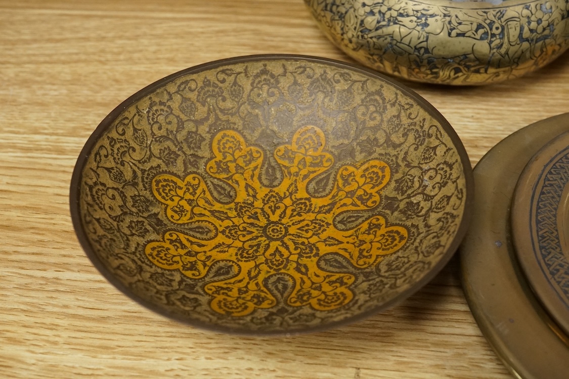 A group of Islamic and Indian brass bowls, largest 15cm in diameter
